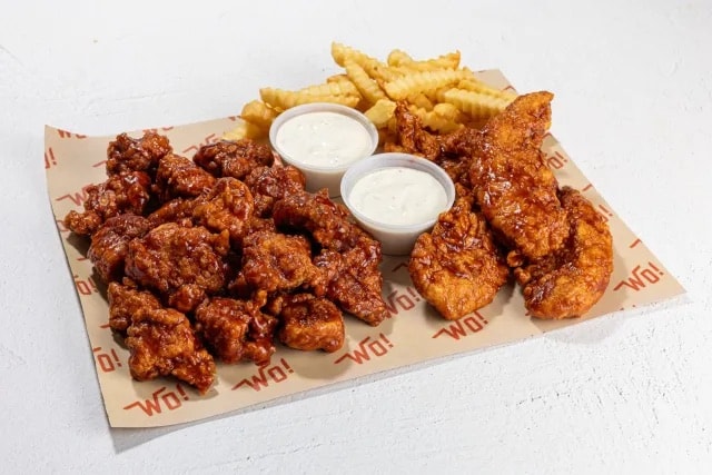 Wings Over Pittsburgh boneless tenders and fries with dipping sauces