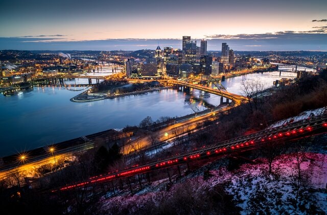 Pittsburgh skyline at night with bridges