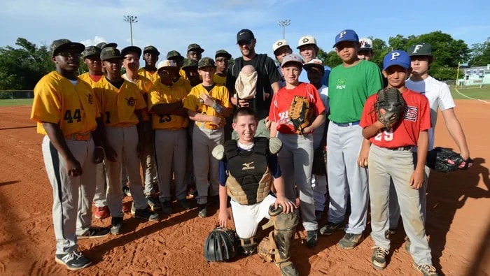 Youth baseball team group photo with coaches