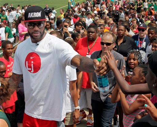 LeBron James at a community event in Akron — connecting with fans and youth
