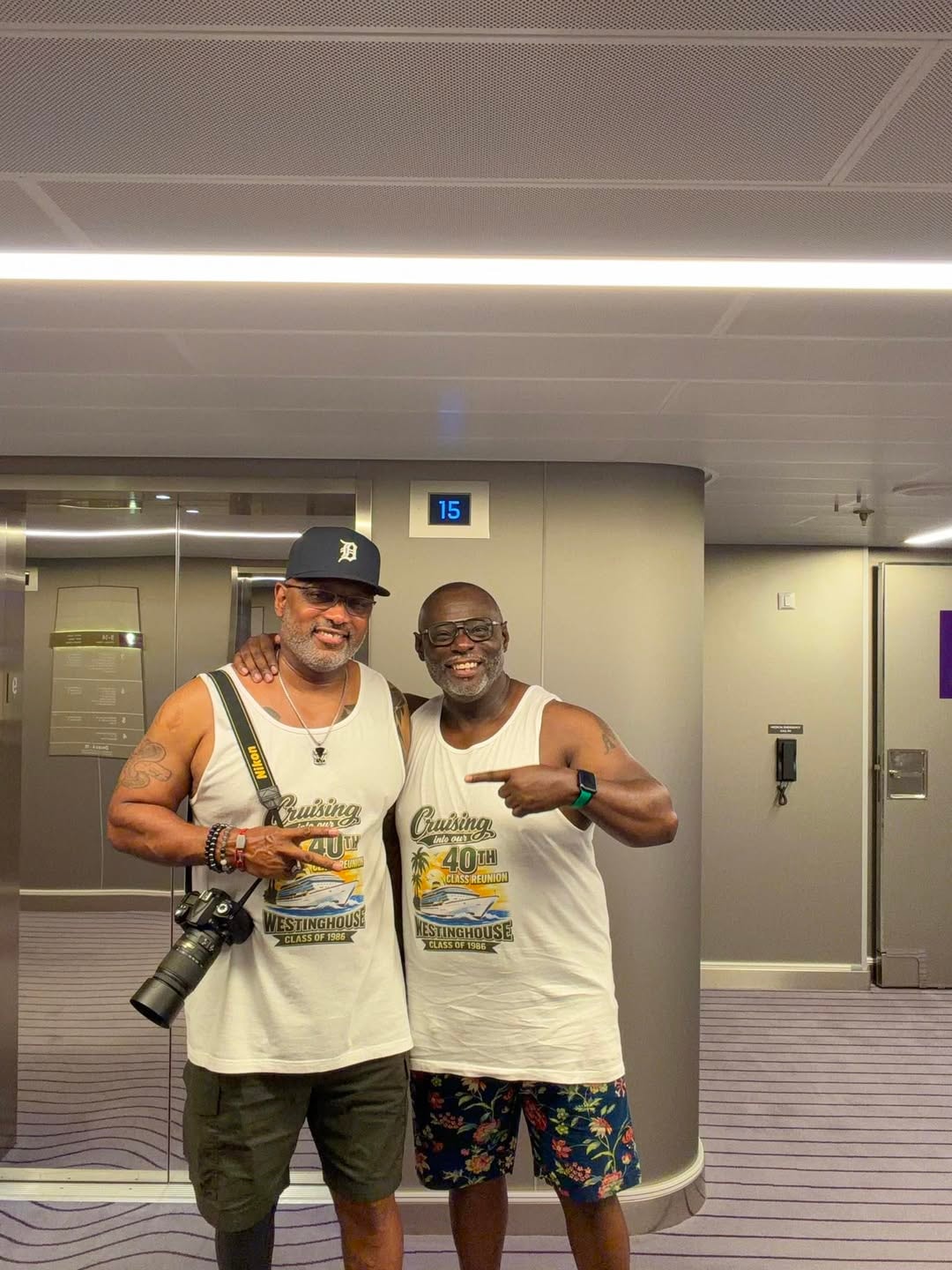 Two Westinghouse Class of 1986 alumni wearing 40th reunion cruise shirts — Cruising Into Our 40th Class Reunion